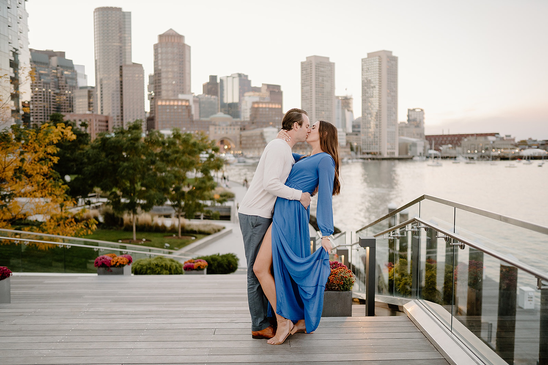 timeless engagement portraits with city skyline in background