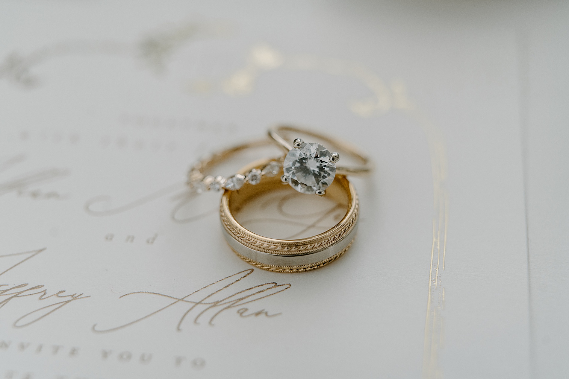 wedding rings on invitation 
