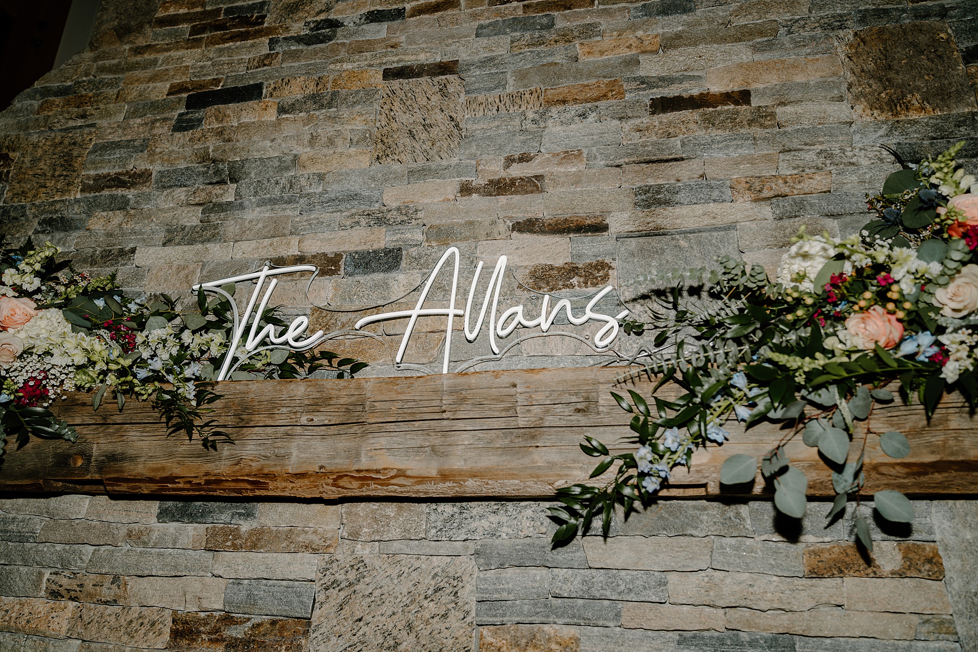 light up sign of couple's last name