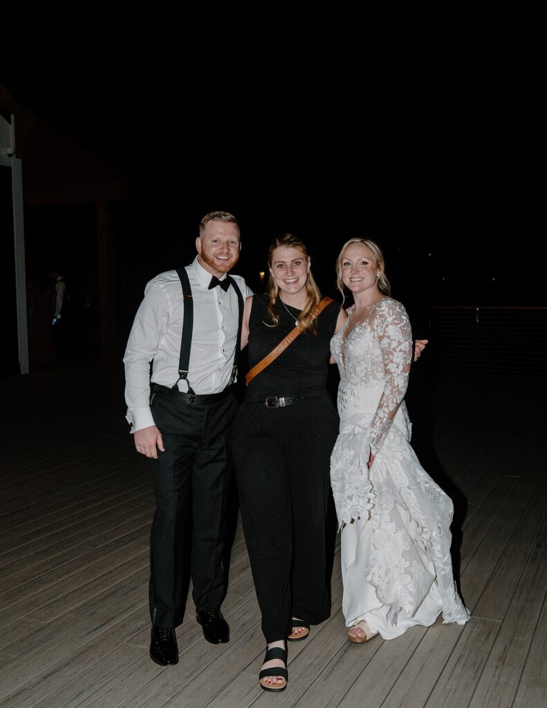 New Hampshire wedding photographer, Breonna Wells with newlyweds 