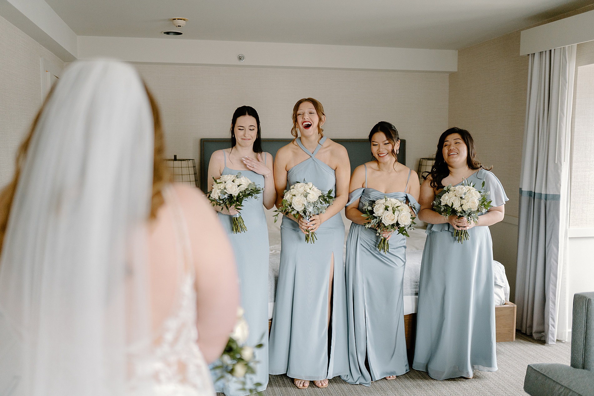 bridesmaids reaction to seeing bride in dress