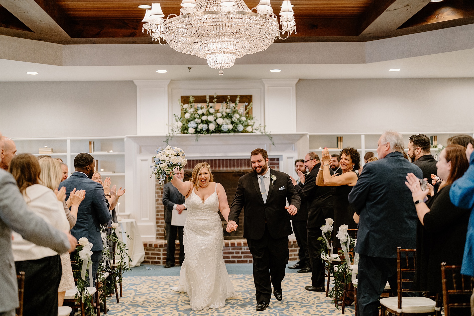 newlyweds exit wedding ceremony as husband and wife