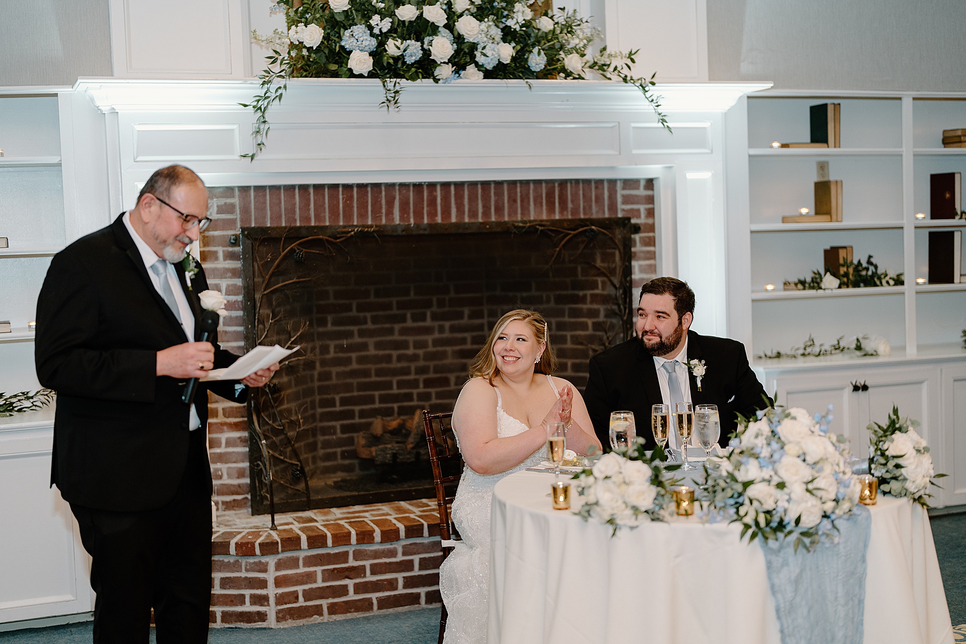 wedding toasts at Church Landing Wedding at Mill Falls at the Lake on Lake winnipesaukee