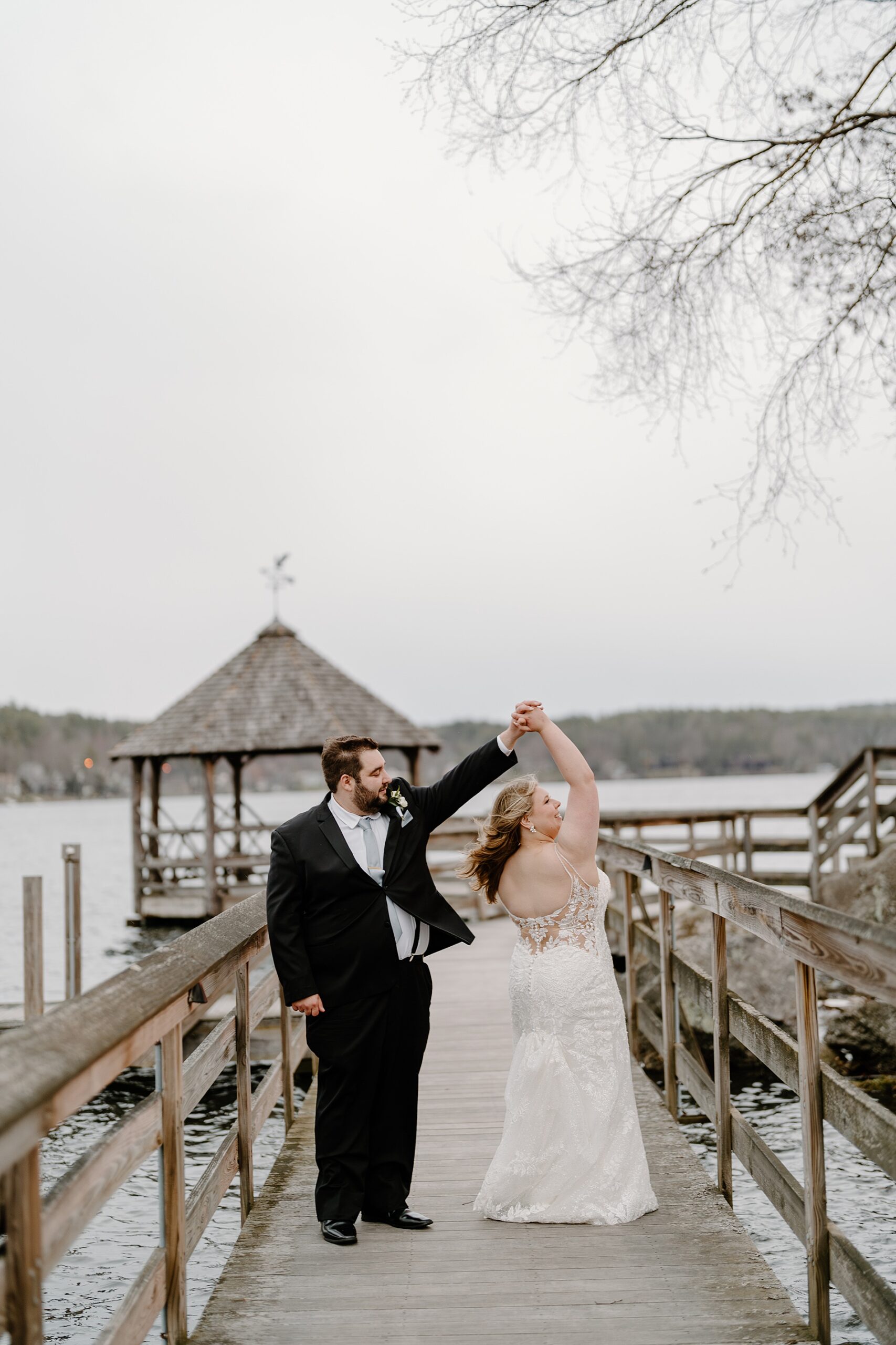 candid wedding portraits at Church Landing Wedding at Mill Falls at the Lake on Lake winnipesaukee